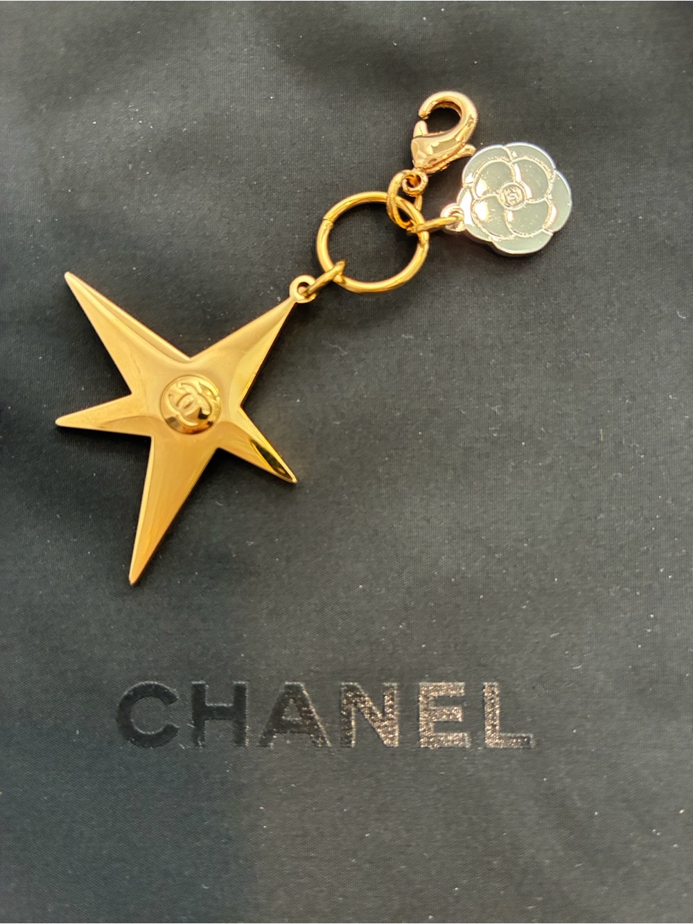 CHANEL Gold Star and Camellia Charm Keyring